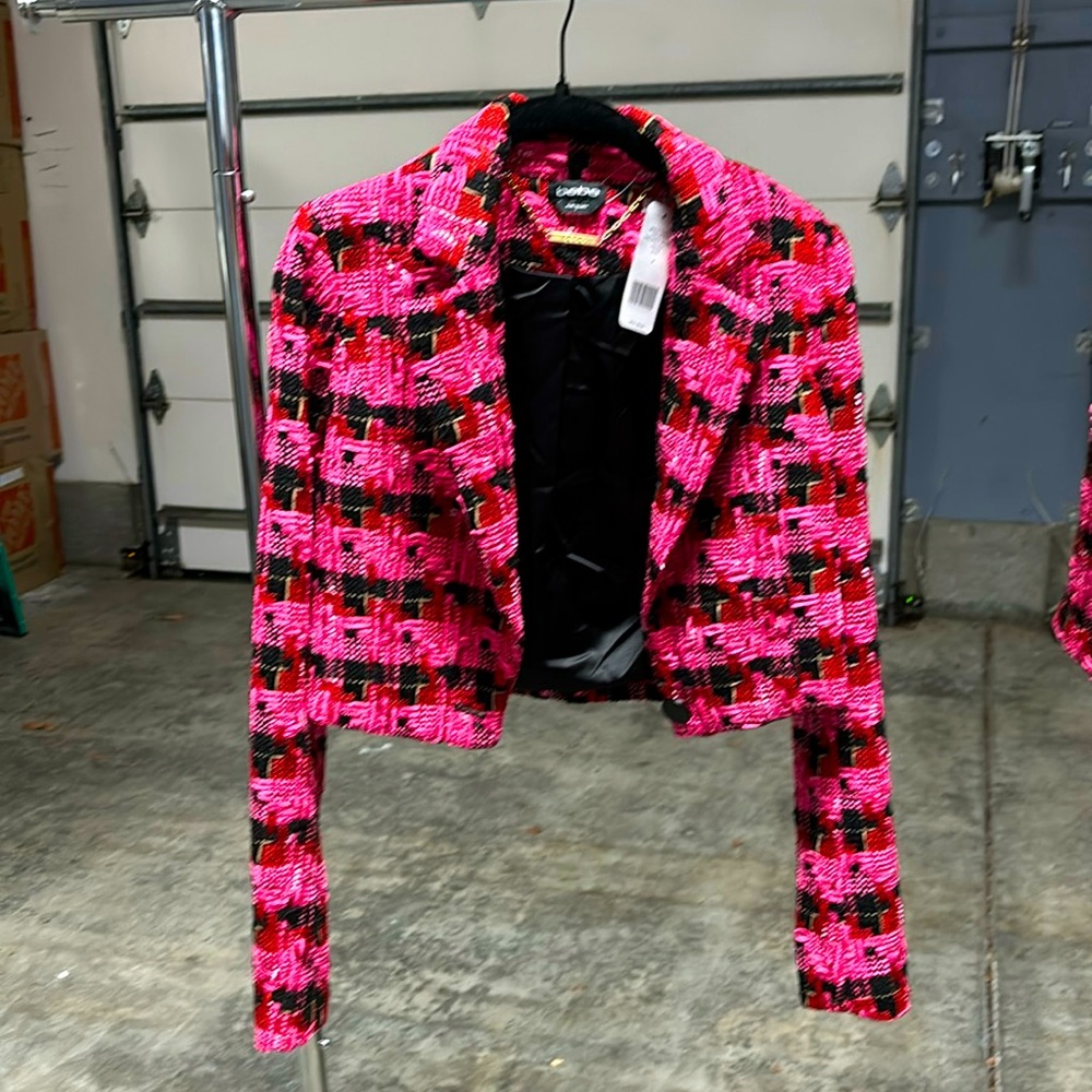 Super cute Bebe, red, pink & black checkered jacket with matching skirt.